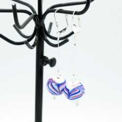 Costume earrings with white, blue, and red glass beads